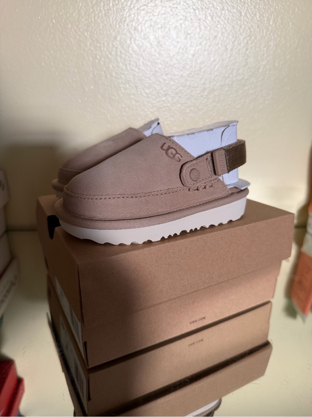 UGG Kids Slip-On Mule in Taupe with White Sole